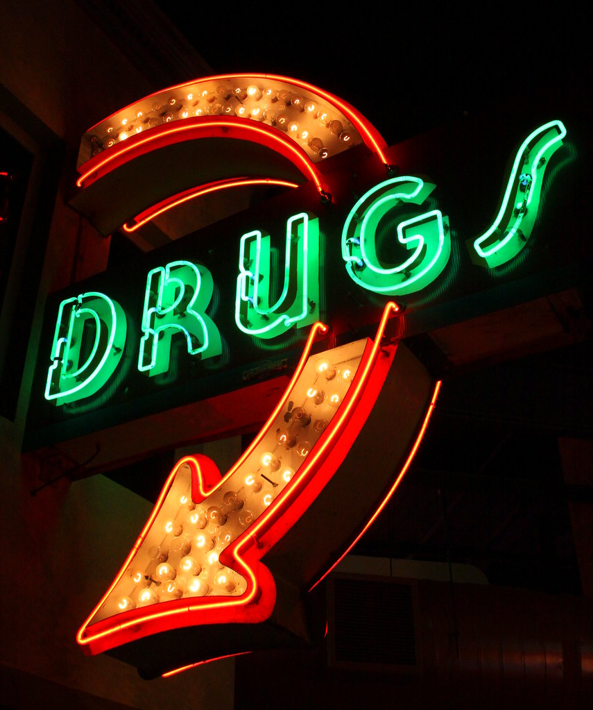 Cartell lluminós de drogues